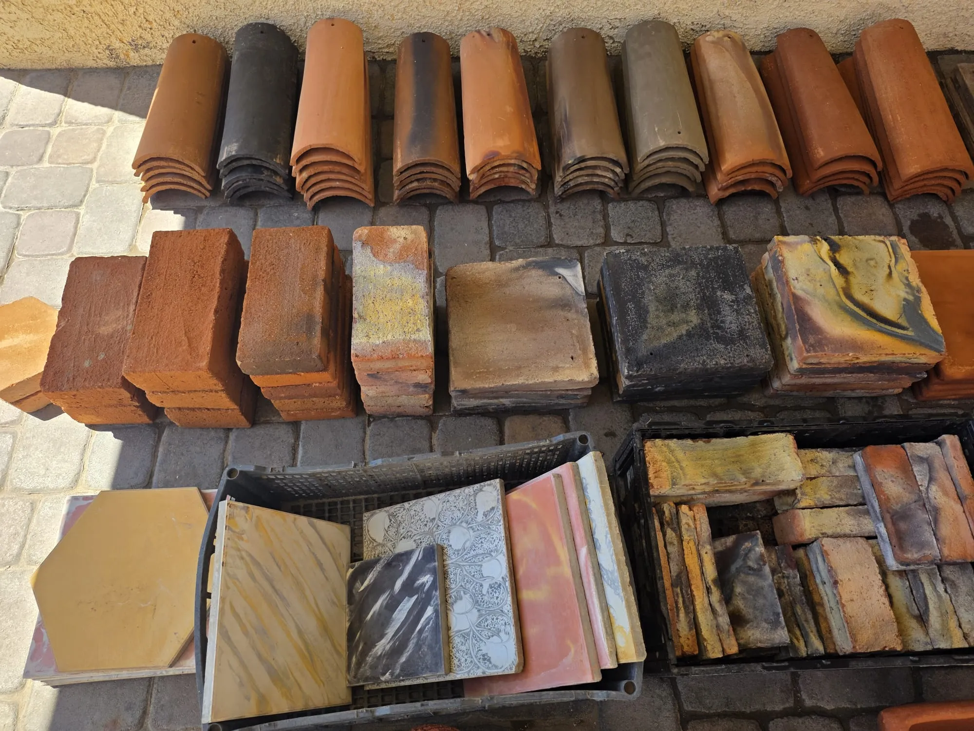 Overhead display of tile, brick, pavers, and decorative clay pieces