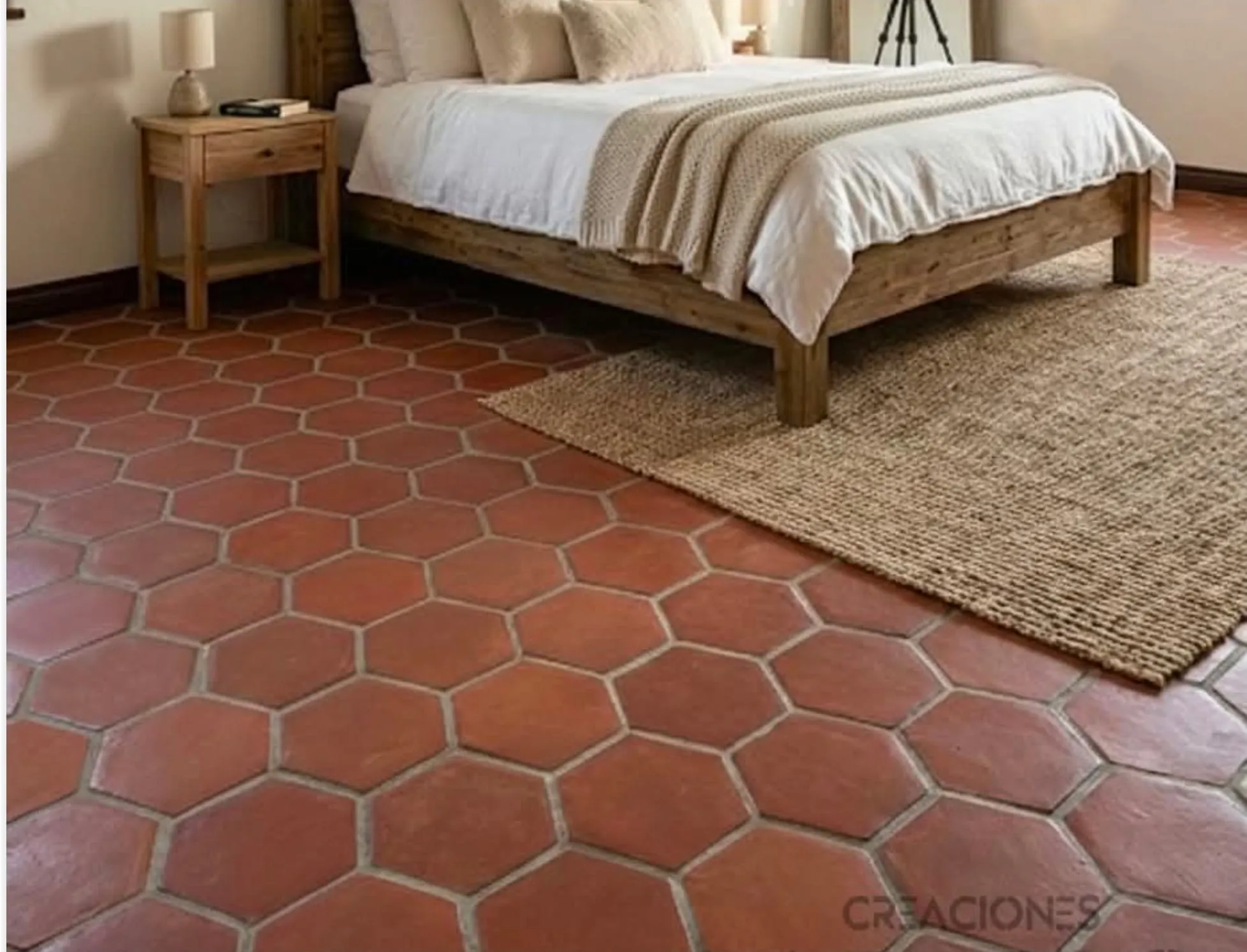 Terracotta hexagonal floor tile installed in a bedroom