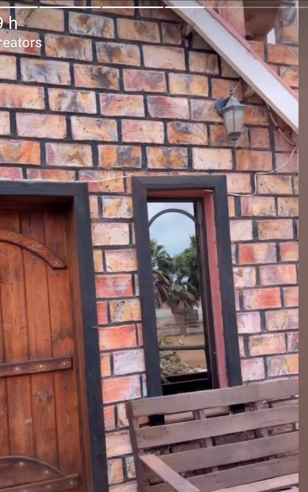 Handcrafted multitone brick installed on a warm, rustic facade